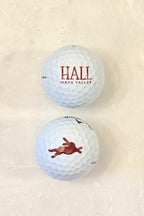 Callaway Chrome Tour golf balls featuring HALL Napa Valley and Bunny Foo Foo logos on a white background