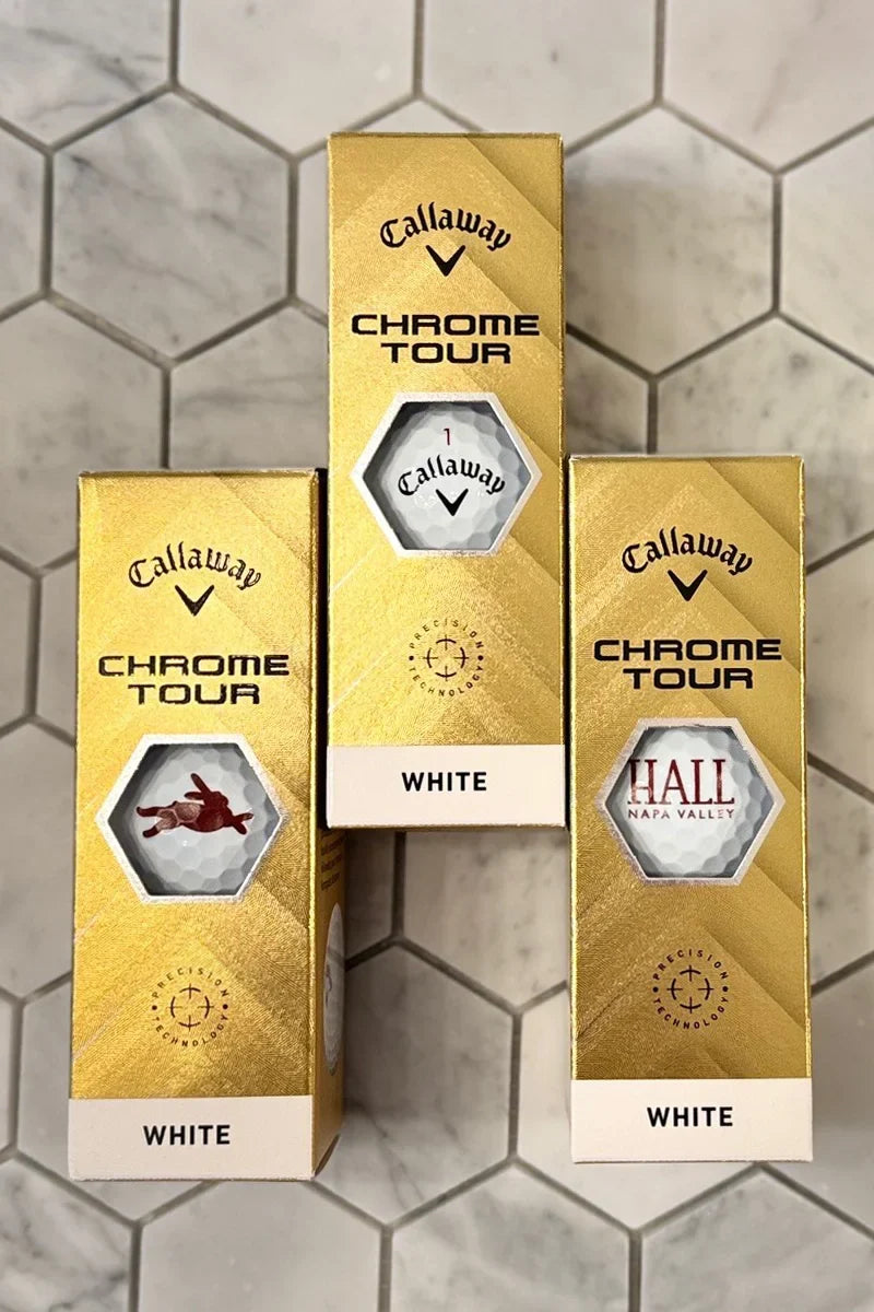 Callaway Chrome Tour golf balls featuring HALL Napa Valley and Bunny Foo Foo logos in gold ball sleeves